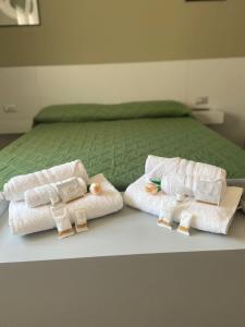 Postel nebo postele na pokoji v ubytování B&B IL Lux