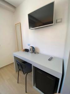TV a/nebo společenská místnost v ubytování B&B IL Lux