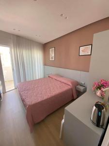 Postel nebo postele na pokoji v ubytování B&B IL Lux