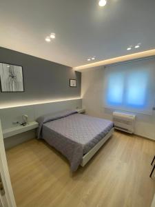 Postel nebo postele na pokoji v ubytování B&B IL Lux