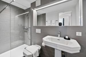 Bagno di GLANDON Rooms Haldenhof - Self-Check-In