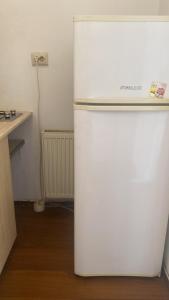 Kuchyň nebo kuchyňský kout v ubytování Apartament Ultracentral cu o camera