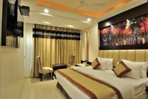 Postel nebo postele na pokoji v ubytování Hotel Sai Miracle - New Delhi