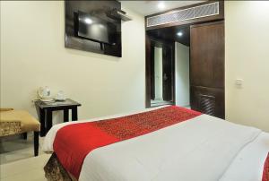 Postel nebo postele na pokoji v ubytování Hotel Sai Miracle - New Delhi