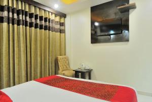 Postel nebo postele na pokoji v ubytování Hotel Sai Miracle - New Delhi