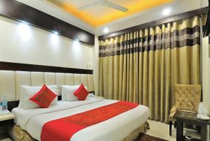 Postel nebo postele na pokoji v ubytování Hotel Sai Miracle - New Delhi