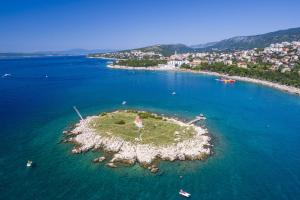an island in the middle of a body of water at La Dama in Novi Vinodolski
