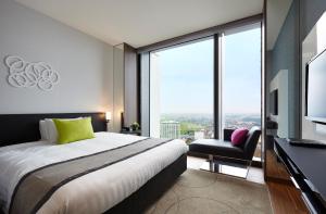 Postel nebo postele na pokoji v ubytování Futakotamagawa Excel Hotel Tokyu