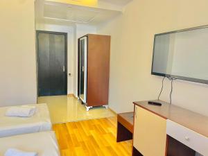 TV a/nebo společenská místnost v ubytování Hotel Argo