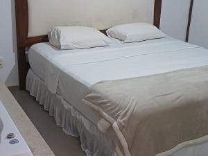 Postel nebo postele na pokoji v ubytování Pousada Canto Da Lua - Macacos