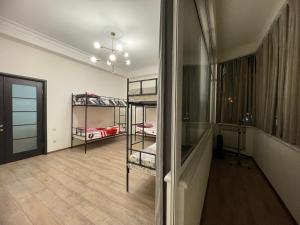 Ένα ή περισσότερα κρεβάτια σε δωμάτιο στο Savannah Pinoy Hostel