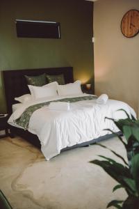 Postel nebo postele na pokoji v ubytování Welterusten Bij Kleine Schuur