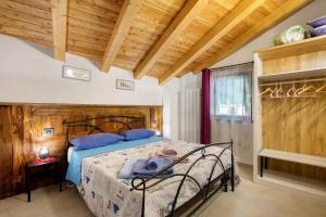 Cama o camas de una habitación en La Maison du Foin