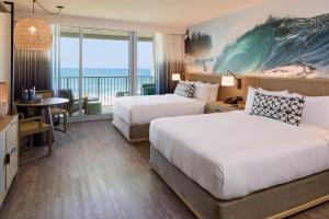 Postel nebo postele na pokoji v ubytování The Ritz-Carlton O'ahu, Turtle Bay