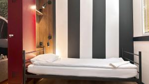 Postel nebo postele na pokoji v ubytování Vola Hostel