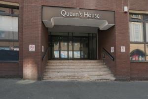 a building with steps leading into a queens house at Heart of the city 1 bed flat Queenshouse in Sheffield