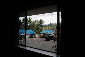 a view from a window of a parking lot at Salida Inn & Monarch Suites in Salida