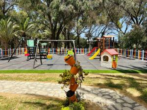 a park with a playground with a play area at Marhaba Royal Salem - Family Only in Sousse