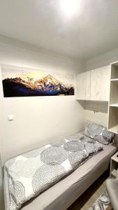 Postel nebo postele na pokoji v ubytování LuxCube 5