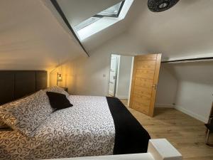 Voodi või voodid majutusasutuse Top Floor toas