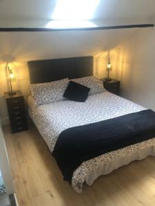 Postel nebo postele na pokoji v ubytování Top Floor