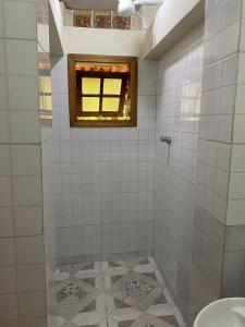 Et badeværelse på Suites da Ana