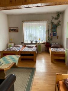 Postel nebo postele na pokoji v ubytování Hostinec- Pension U Havlů