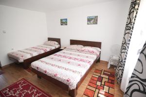 Postel nebo postele na pokoji v ubytování Casa Ion