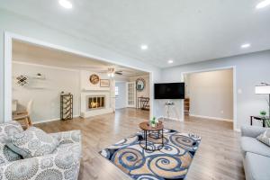 a living room with a couch and a fireplace at A good vibe state of mind II in Jonesboro