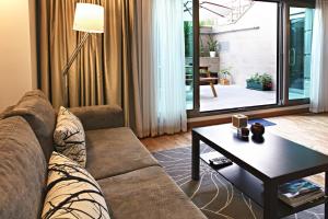 a living room with a couch and a table at Apartman Istanbul in Istanbul