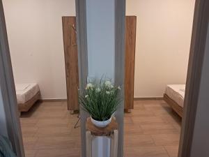 Ένα ή περισσότερα κρεβάτια σε δωμάτιο στο Four Seasons