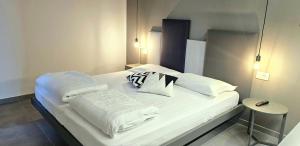 Ένα ή περισσότερα κρεβάτια σε δωμάτιο στο Apartament 59