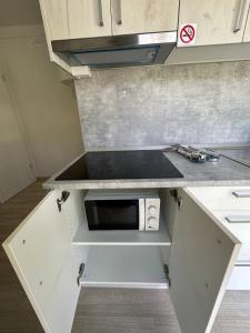 Kuchyň nebo kuchyňský kout v ubytování LuxCube 3 + 7 fotografií