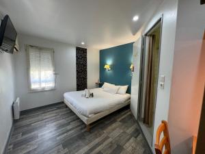 Voodi või voodid majutusasutuse Fasthotel Avignon Nord Le Pontet toas