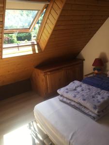 Una cama o camas en una habitación de Pyrène