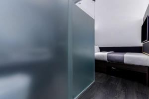 Postel nebo postele na pokoji v ubytování The Z Hotel Holborn