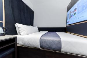 Postel nebo postele na pokoji v ubytování The Z Hotel Holborn