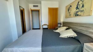 En eller flere senge i et værelse på Darsena B 2-4