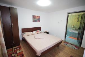 Postel nebo postele na pokoji v ubytování Casa Ion