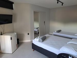 Cama ou camas em um quarto em Artsy Vitoria Hostel