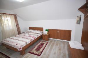 Postel nebo postele na pokoji v ubytování Casa Ion