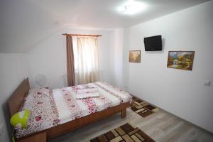 Postel nebo postele na pokoji v ubytování Casa Ion + 37 fotografií
