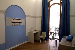 Posezení v ubytování Giuliani Rooms