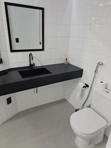 Um banheiro em Artsy Vitoria Hostel