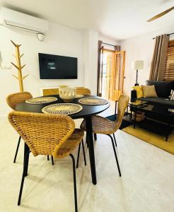 Et tv og/eller underholdning på Jardin Alhambra Holiday Apartment