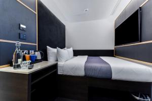 Postel nebo postele na pokoji v ubytování The Z Hotel Holborn