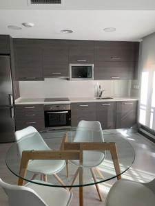 Η κουζίνα ή μικρή κουζίνα στο EH - Apartamentos Heroísmo