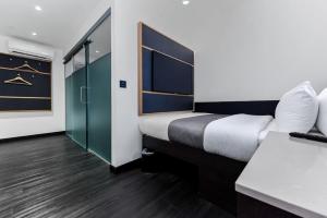 Postel nebo postele na pokoji v ubytování The Z Hotel Holborn