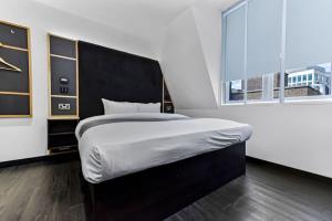 Postel nebo postele na pokoji v ubytování The Z Hotel Holborn