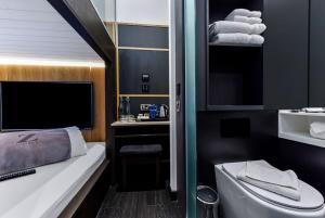Postel nebo postele na pokoji v ubytování The Z Hotel Holborn